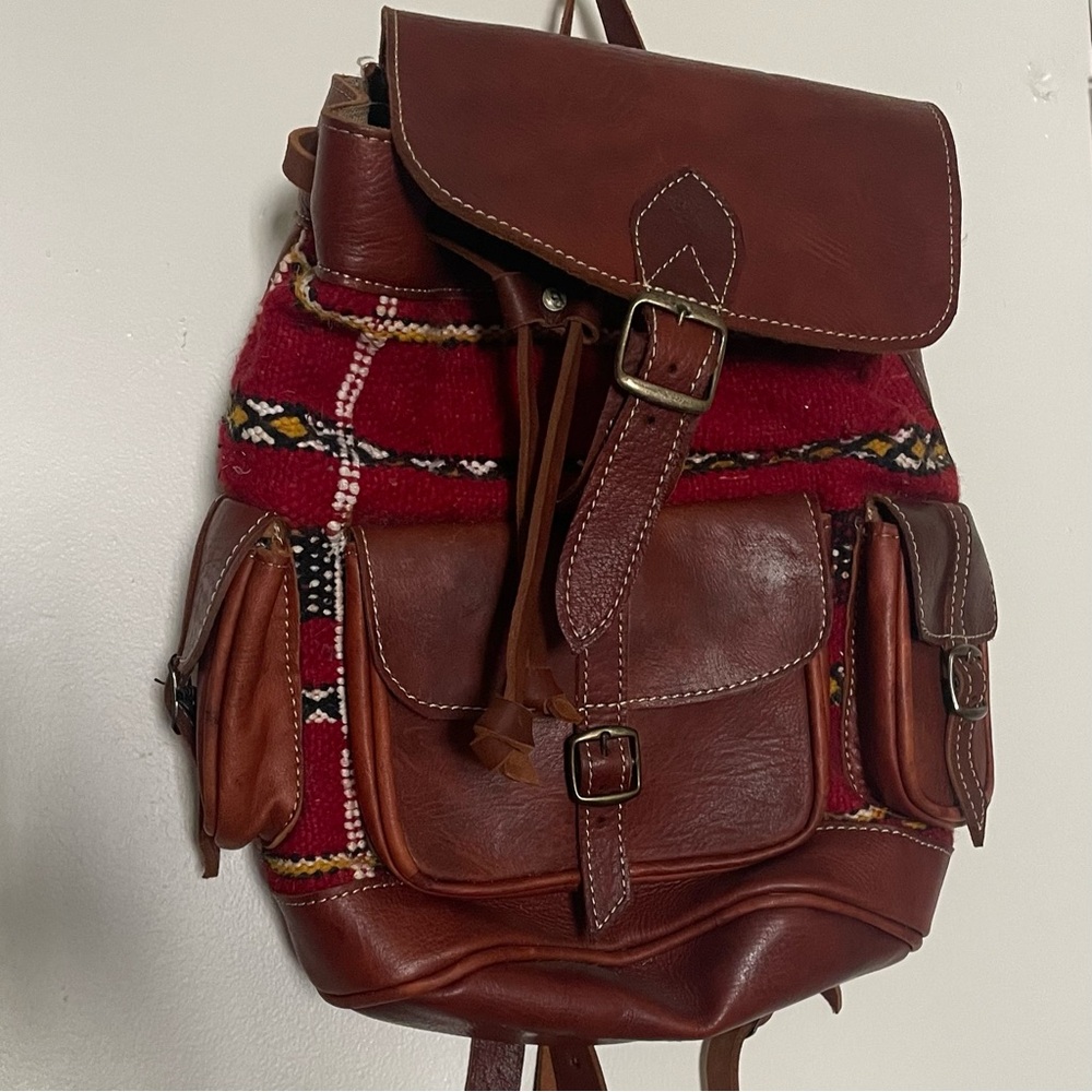 Brown Leather Backpack with Red Accents